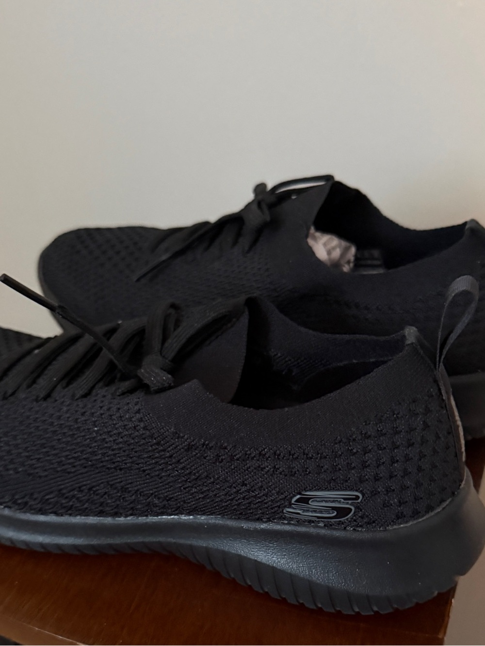 Skechers Women's Black Knit Slip-On Sneakers